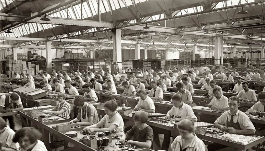 Factory workers in industrial revolution